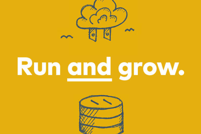 "Run AND grow." 2-pronged plug-like cloud hovering above an outlet-like silos.