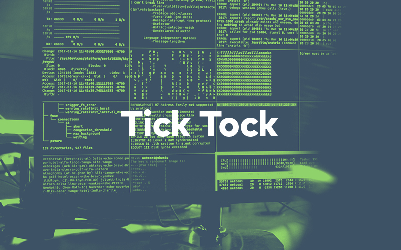 Computer screens with code overlaid with the words "Tick Tock"