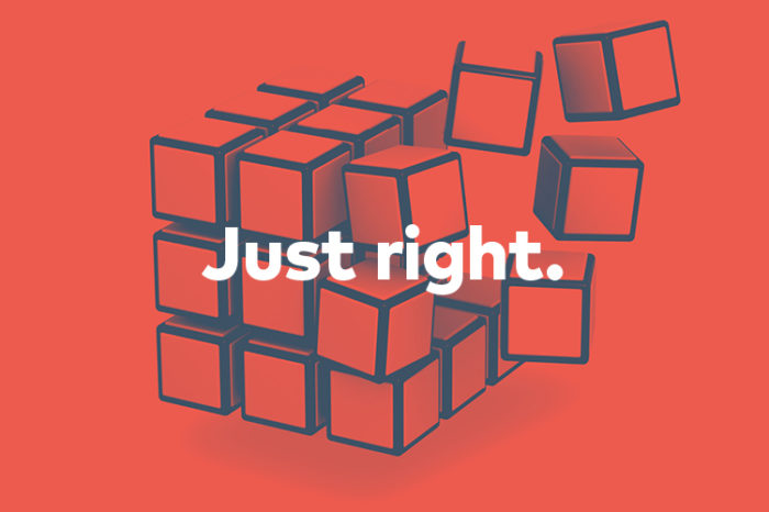 Red image of cubes stacked together to form a larger cube. Text reads “Just right.”